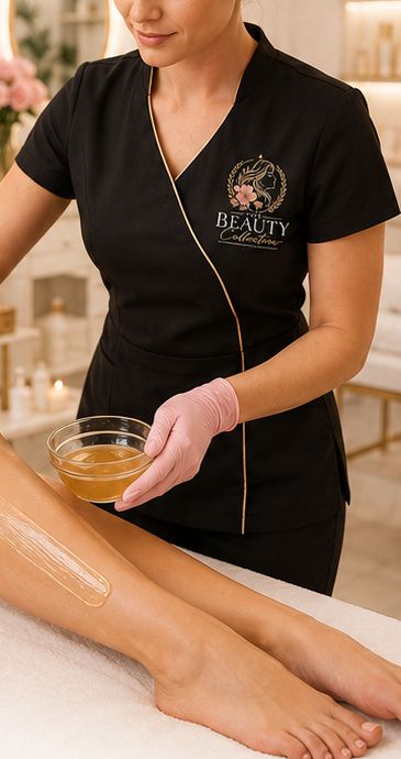 Therapist applying wax to a client's leg